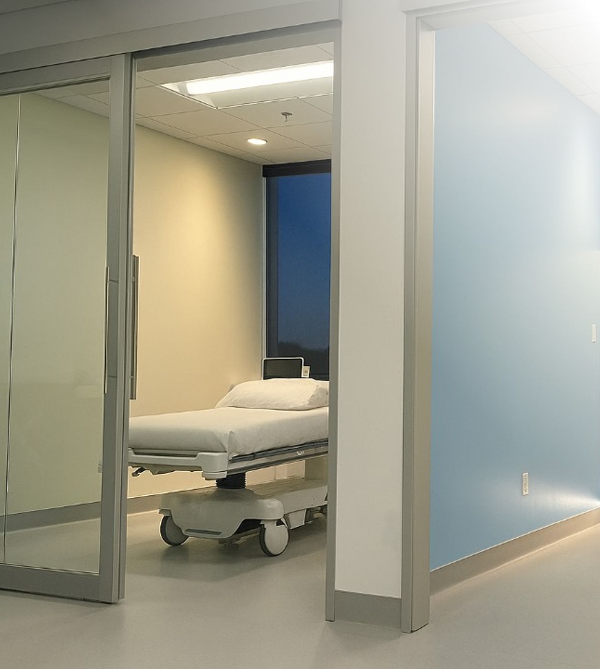 Woman in white top with black skirt.